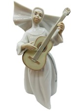 Lladro Nun Figurine Playing