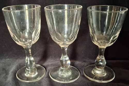 Three antique hand blown wine