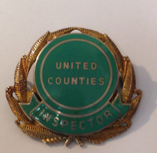 VINTAGE UNITED COUNTIES INSPECTORS CAP BADGE