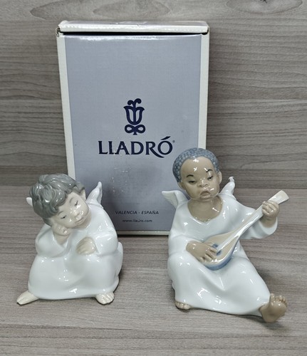 Lladro 4539 sitting cherub - lladro,