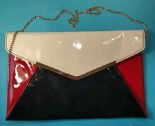 DUNE envelope clutch shoulder bag, patent red cream black, gold chain