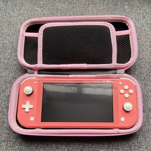 Nintendo switch lite coral - nintendo,