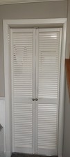 white painted louvre doors
