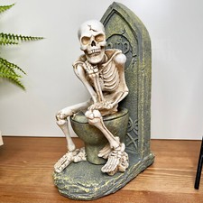 Skeleton On The Toilet