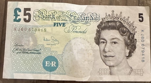 Circulated old five pound - five, note