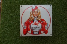 A MOBILOIL FEMALE ENAMEL SIGN