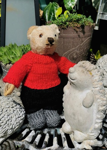 Hand knitted teddy bear - hand,