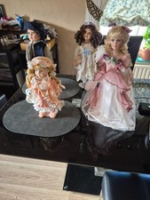 Much loved porcelain doll - much,