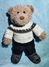 Hand knitted teddy bear
