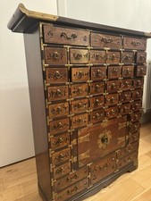 Chinese wooden Medicine Cabinet With An Arrangement Of 45 Small Drawers Carved 