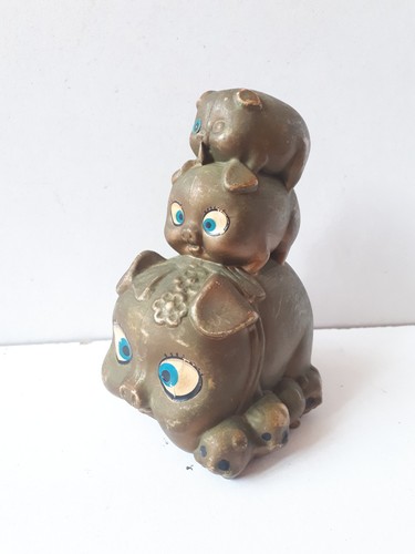 Gold stacked piggy bank coin - stacked,