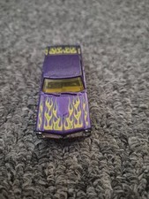 Hot Wheels 2016 H.W. Flames '65 Pontiac GTO, specifically the metalflake purple 
