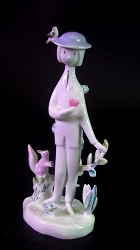 Figurine with squirrel - &, bird