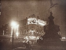 Piccadilly Circus at night 1932 by Central Press