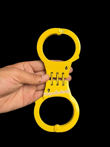 Yellow color metal handcuffs - yellow,