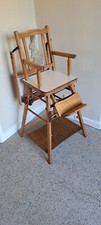 1950s vintage child's high chair with fold down play table