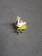 Macmillan cancer relief pin - relief,