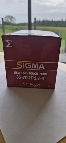 Sigma 70mm 8 4 one - f/2.8-4,