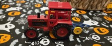  BRITAINS VOLVO BM2654 RED TRACTOR WITH PLOUGH 1/32 SCALE