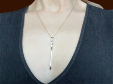 A most unique antique!  Gold and diamond "snuff spoon" pendant.