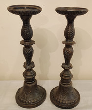A  Pair of Cast Iron Candle Sticks Vintage  dark decorative  pieces.height 37cm 