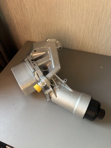 Engine oil filter housing - oil,