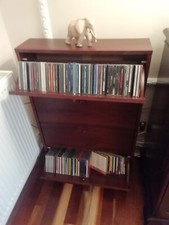 CD  STORAGE CABINET.    Holds
