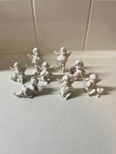 Pair resin cherubs holding - cherubs,