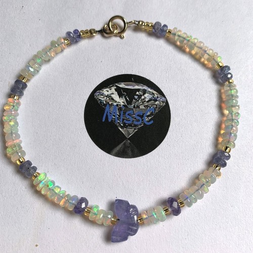 9ct gold tanzanite and fire - tanzanite,