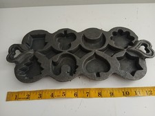 VINTAGE CAST IRON cookie Wax