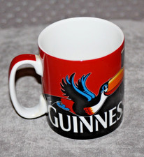NEW OLD STOCK GUINNESS MUG RED BLACK TOUCAN LOGO