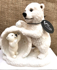 Polar Bear And Baby In