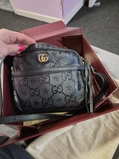 Gucci GG Star Embossed Leather
