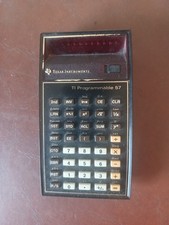 Texas TI Programmable 57  Calculator With Instruction Manual. Untested.