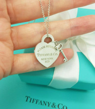 Return to Tiffany & Co. Heart tag and Key Pendant 18 Inches Silver Necklace