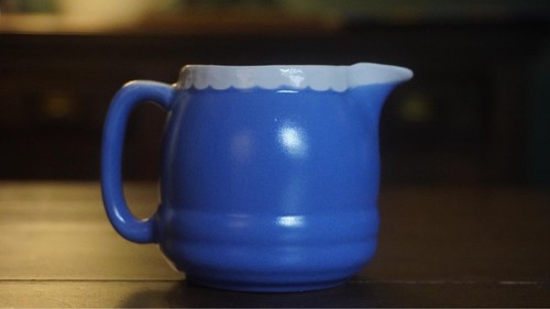 Blue pottery souvenir jugs - blue,