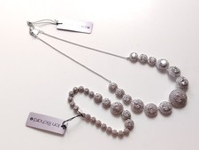 Silver Tone Sparkling Jon