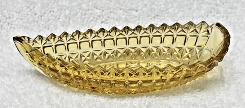 Old golden yellow glass boat - old,