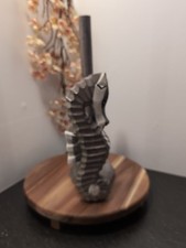 Grey and white seahorse - and,