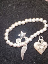 Bibi Bijoux Silver Tone Elasticated Bracelet With Extra Charms