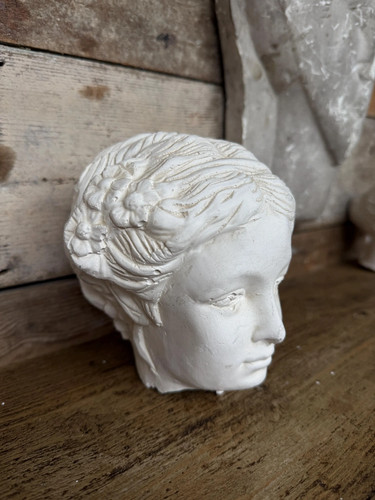 Decorative small plaster head