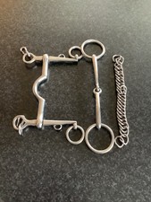 Double bridle bits with curb