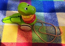 John Crane Pintoywooden Stack N Pull Along Dinosaur Toy