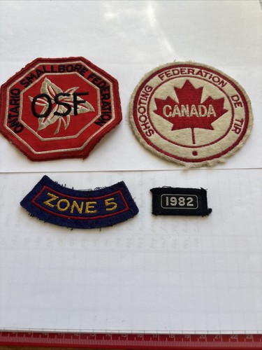 Four canadian shooting badges - four,