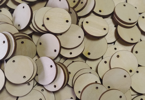Wooden disk with - with, holes