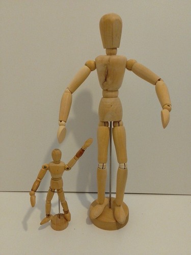 Wooden mannequin and - in,