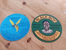 Black Boy and Wasp Pellet tin lid  "tin" signs