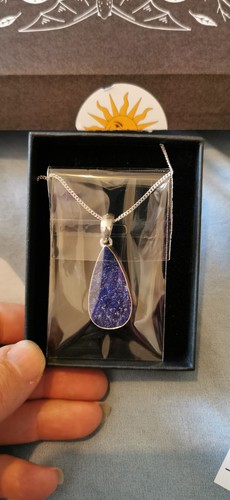 Silver necklace above - necklace,