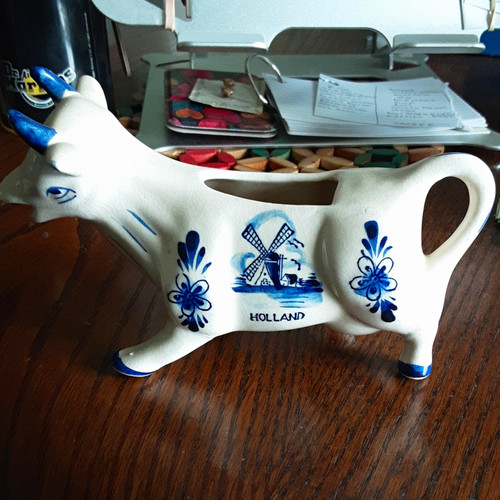 Blue white cow shaped - &,