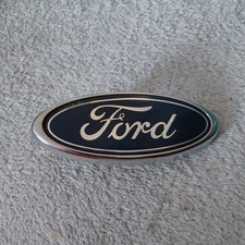 FORD FOCUS MK 1 GRILLE FLIP OVAL BADGE